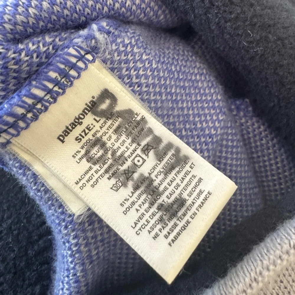 Patagonia Beanie Hat, snowflake design with small tassel top.